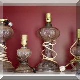 DL10. Glass whale oil lamps converted to electricity. 
